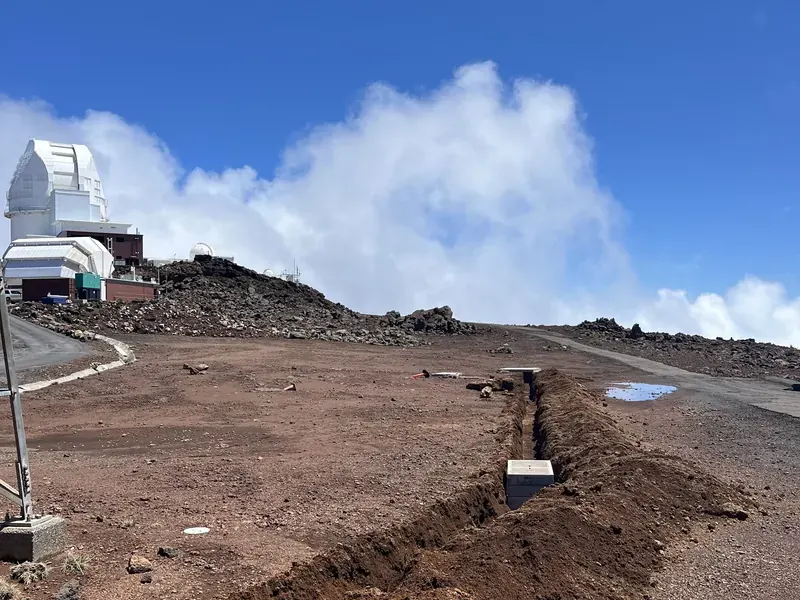 Utility trench cut through volcanic ground near the summit observatories on Haleakala